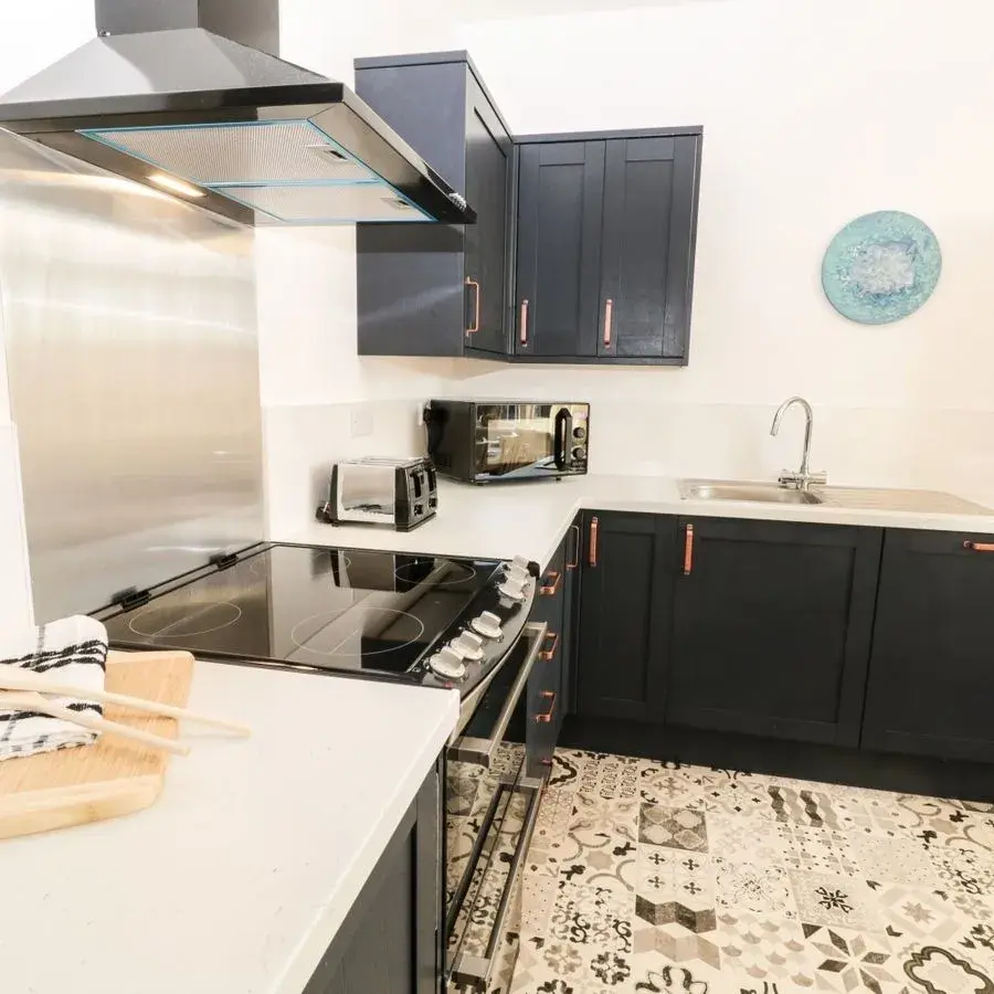 Comfortable king-size bedroom at Falconhurst holiday let Robin Hoods Bay - one of three bedrooms